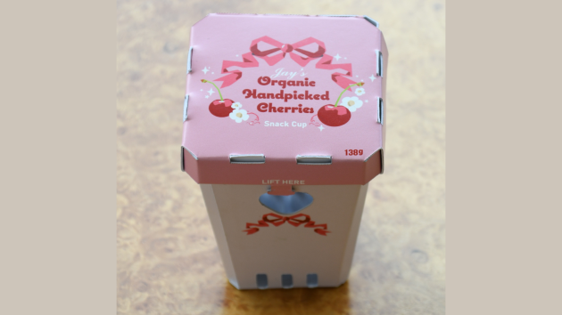 Pink and brown paperboard package for cherries.